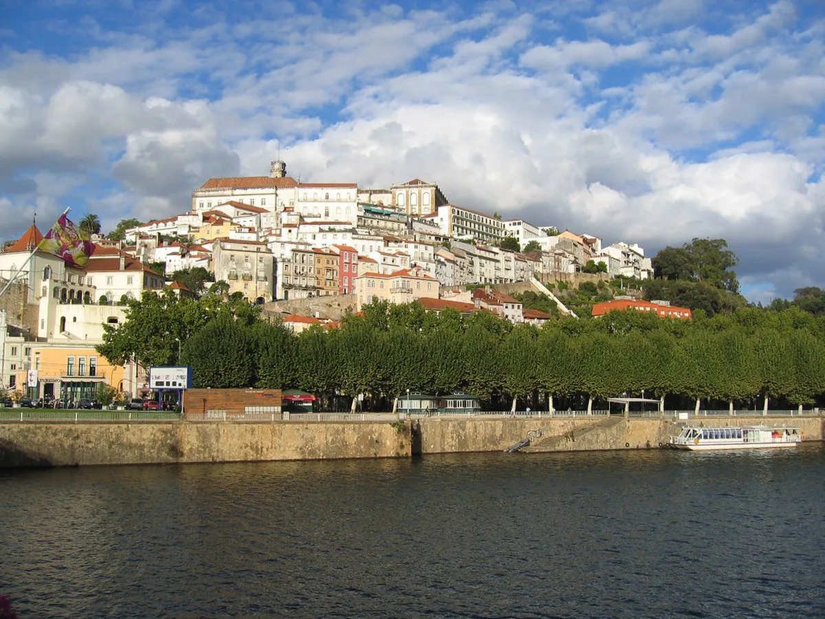 Historic riverside view of Coimbra old town in Portugal