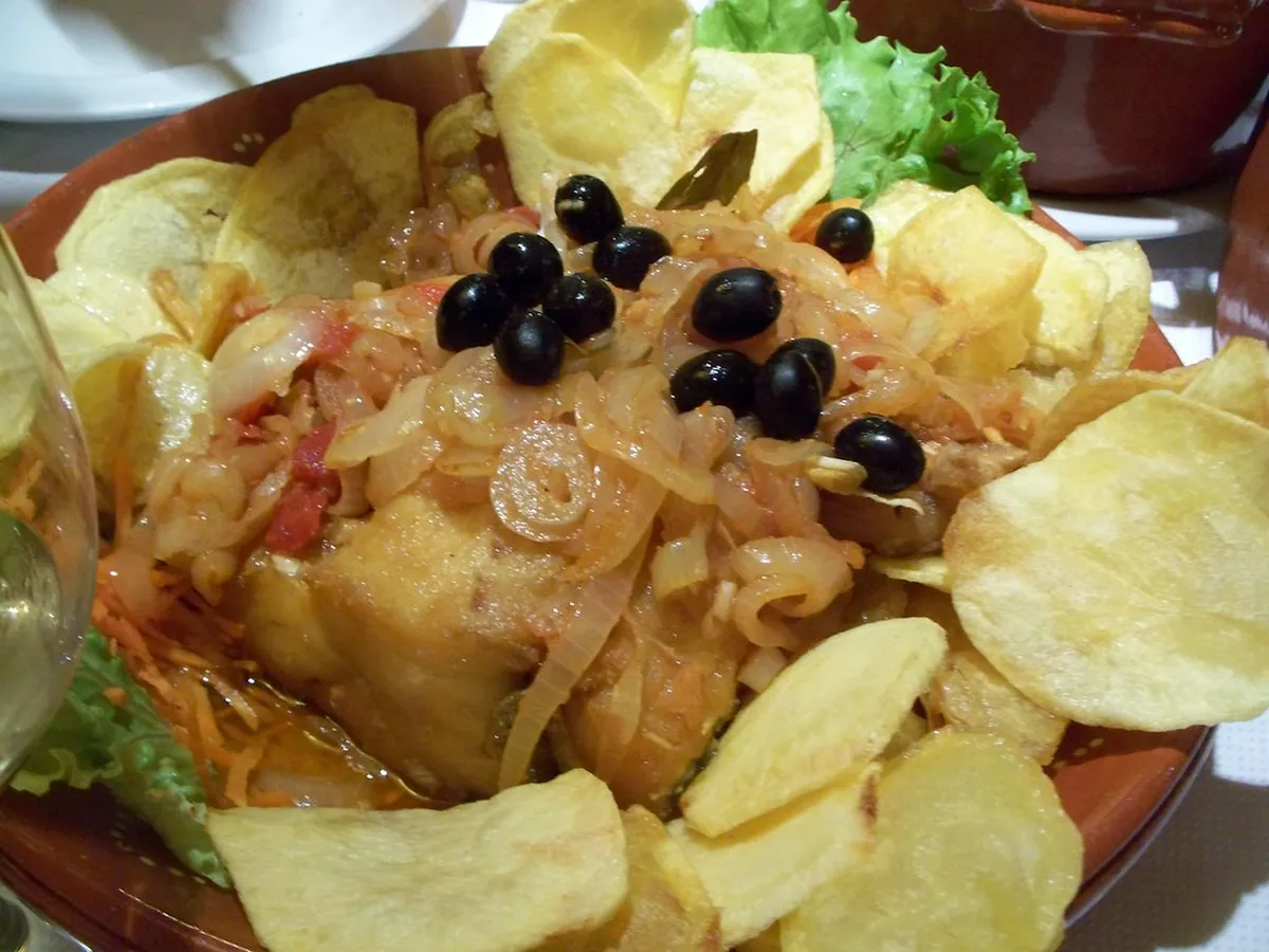 Traditional Braga bacalhau codfish dish served at a local restaurant, a signature authentic Braga food experience