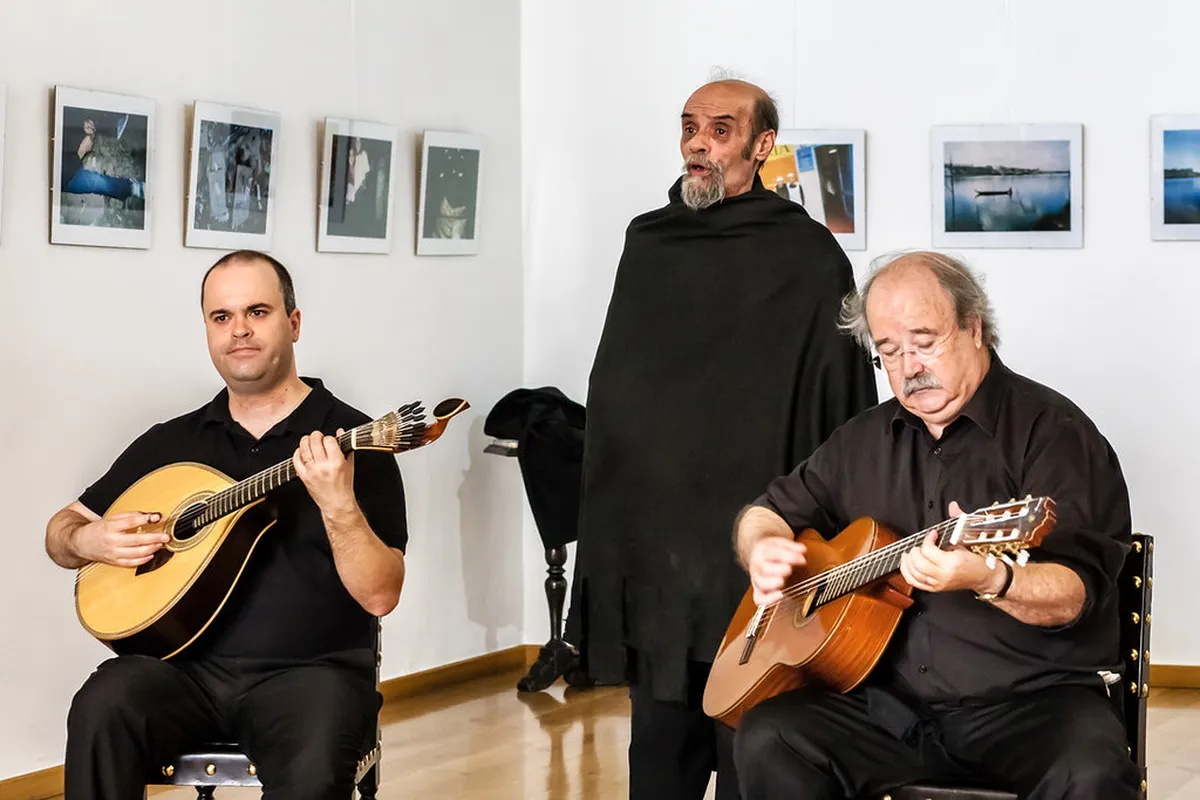 Historic Café Santa Cruz interior in Coimbra with Gothic arched ceilings setting the stage for traditional fado music