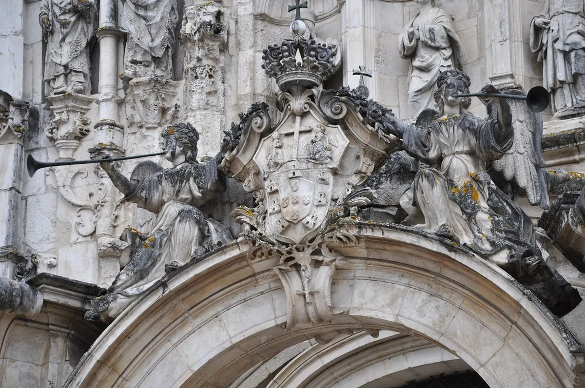 Ornate Manueline facade of Coimbra's Mosteiro de Santa Cruz with its elaborate stone carvings