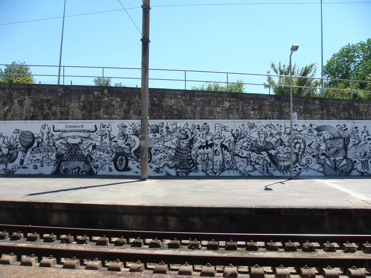 Coimbra train station entrance where taxis queue and travellers easily hail rides in the city