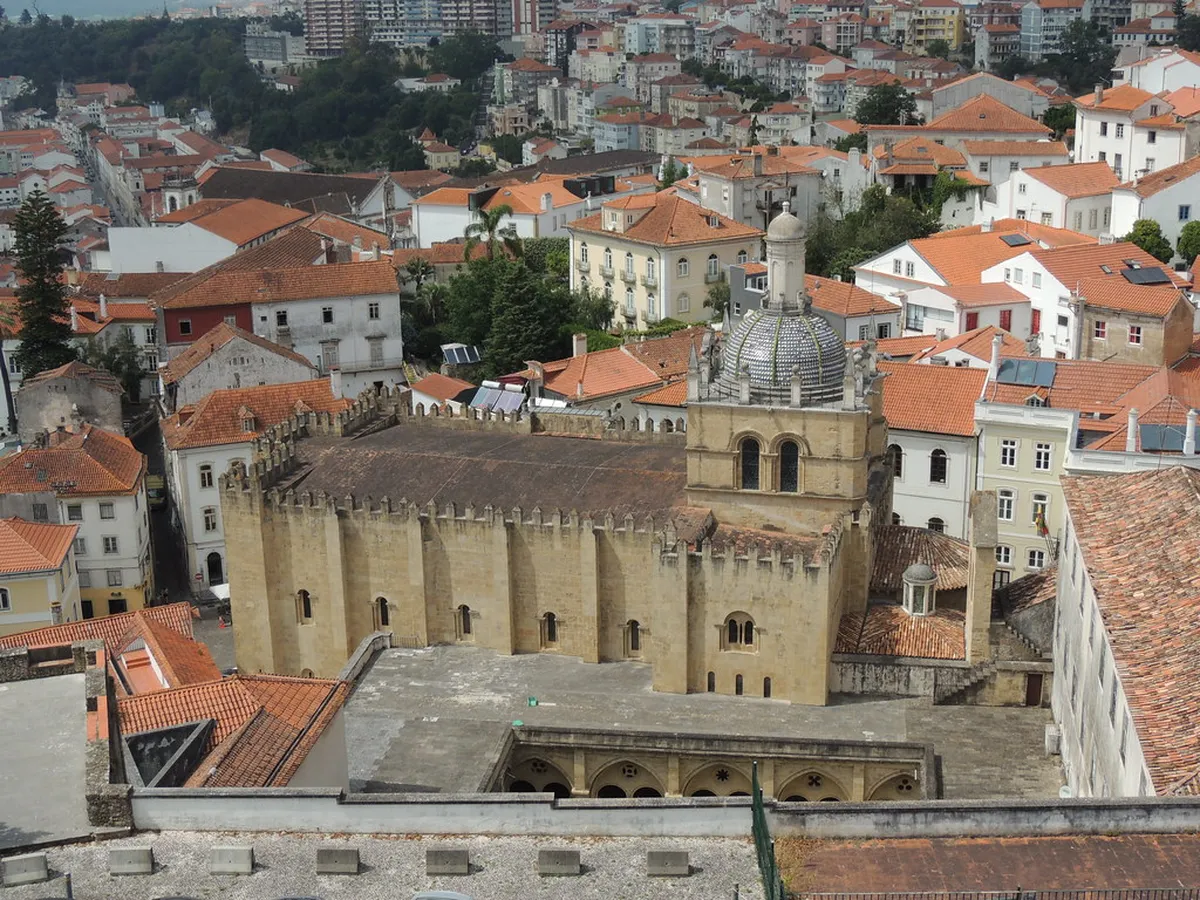 Coimbra Old Cathedral medieval stonework rising above the ancient royal city streets