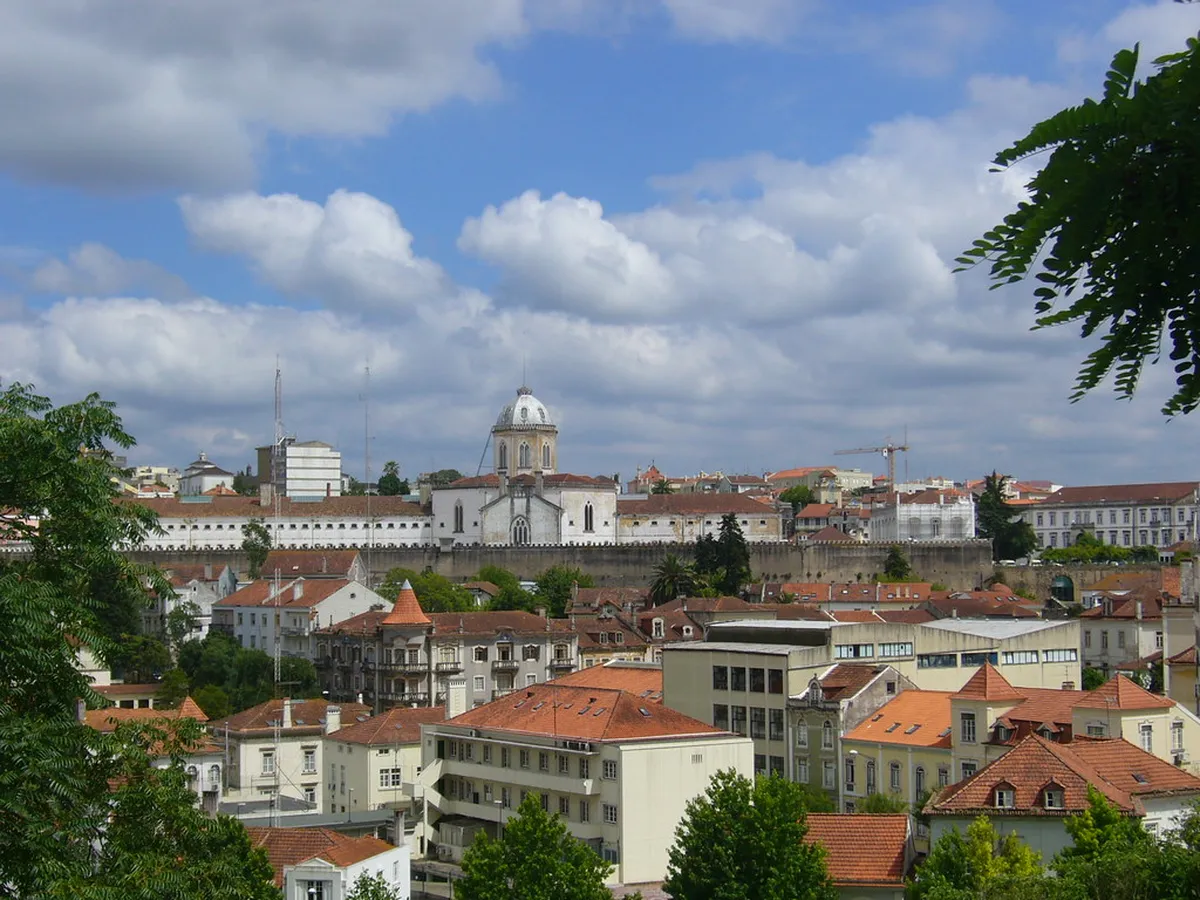 Historic hilltop view of Coimbra's ancient University Hill with medieval architecture and sweeping city panorama