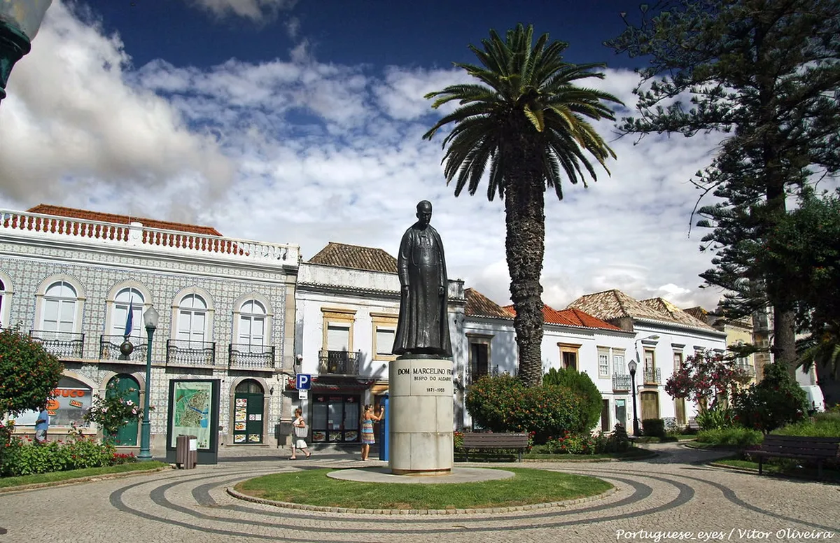 Scenic view of Tavira historic center with Roman bridge crossing the Gilão River, near Faro in the Algarve