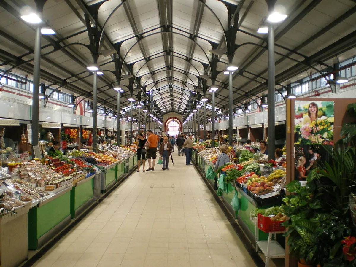 Colourful local produce and craft stalls at Loulé covered market, a beloved inland day trip from Faro in the Algarve