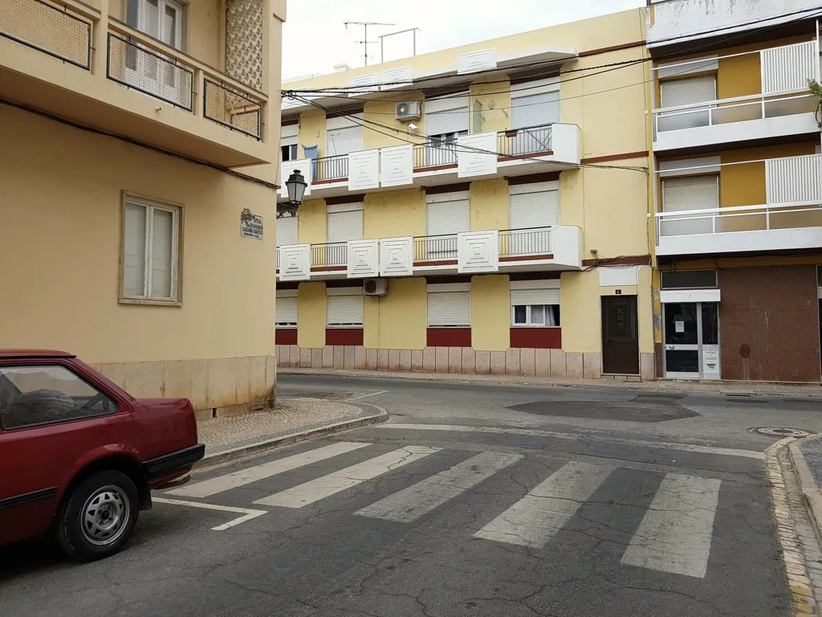 Faro street scene near the historic market district showing local life and architecture