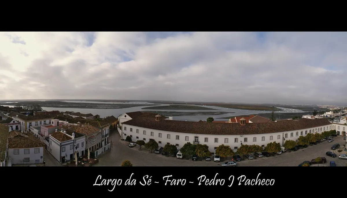 Largo da Sé square in Faro old town with cobblestone pavement and historic buildings