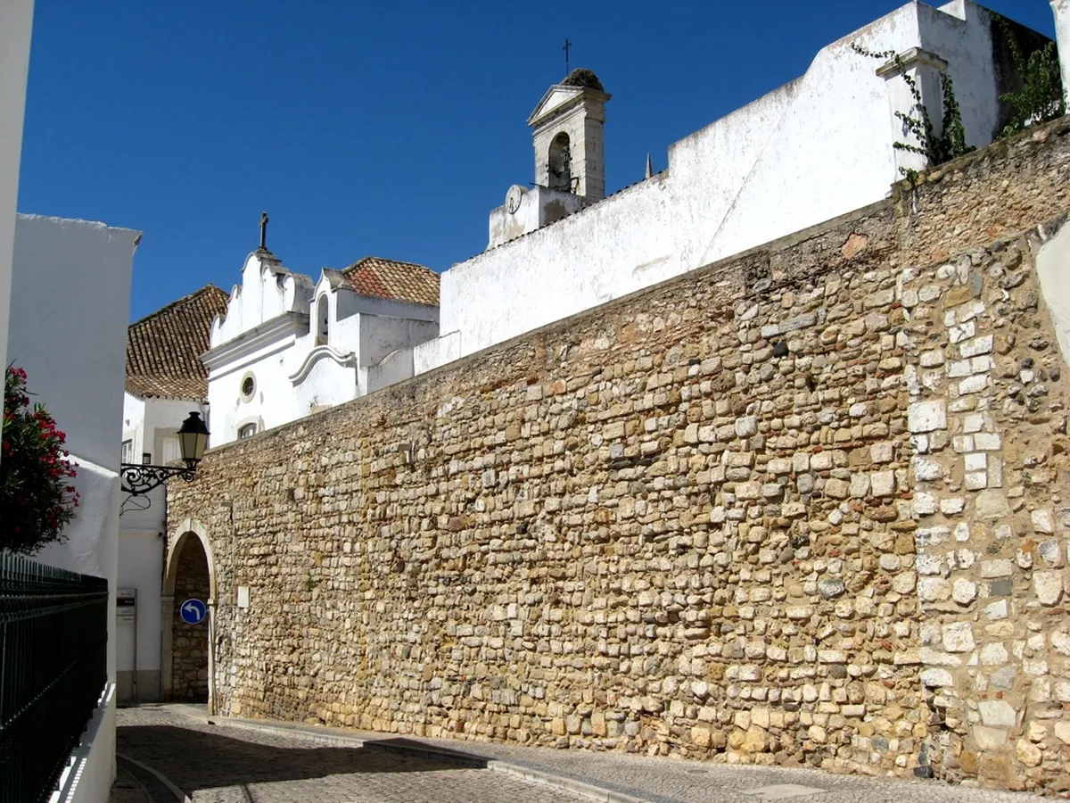 Arco da Vila neoclassical arch in Faro framing the entrance to the historic old town Cidade Velha