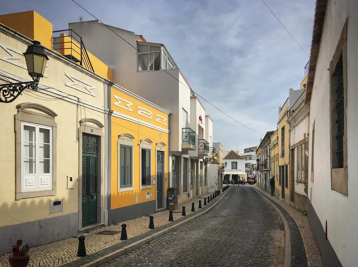Faro old town historic center with Cathedral tower and medieval streets in Algarve