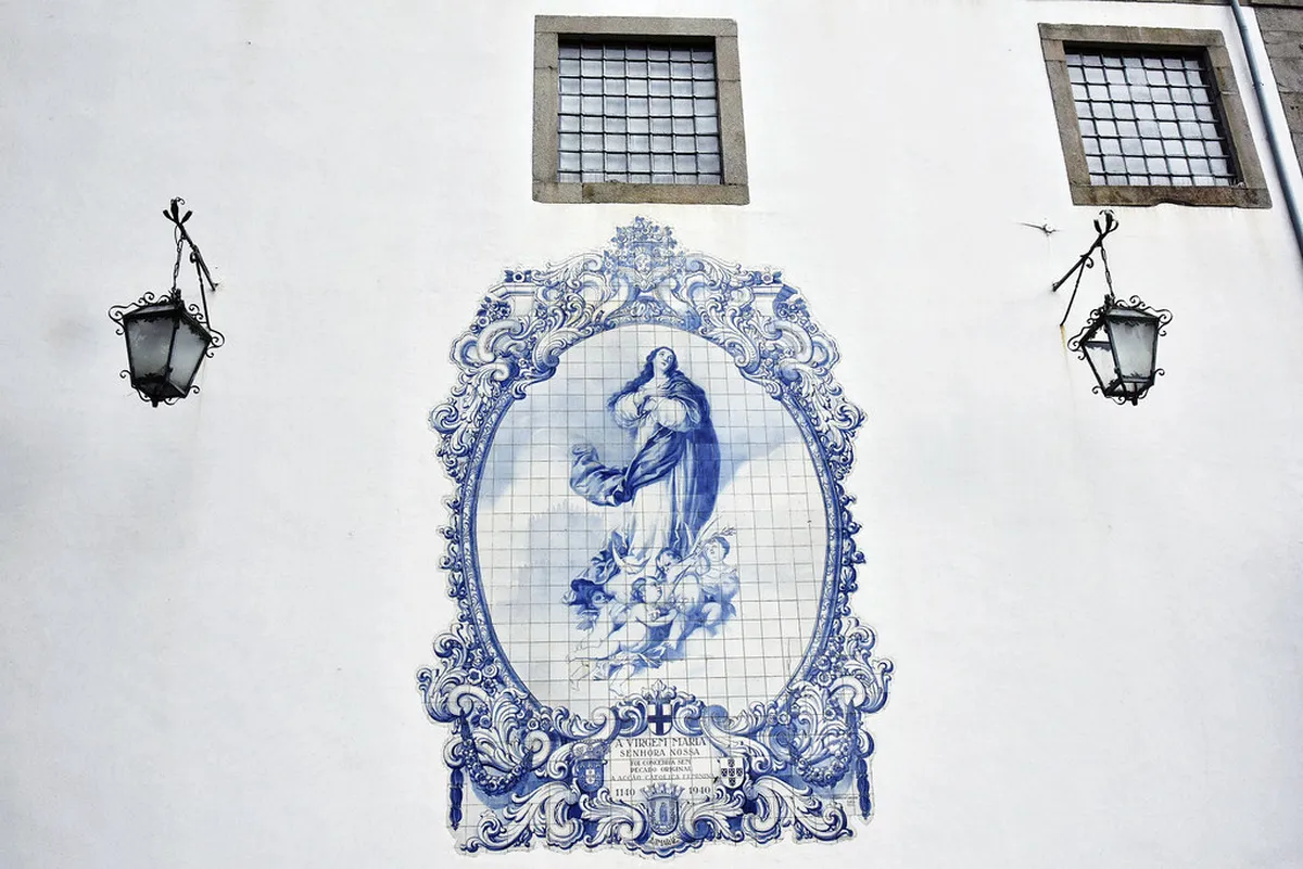 Twin Baroque bell towers of Igreja do Carmo rising above Faro's historic skyline