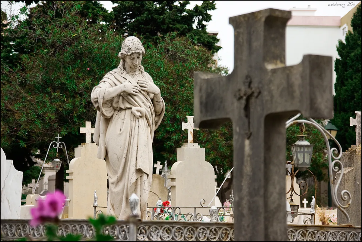 Historic Jewish cemetery near Faro old town with tombstones bearing Hebrew inscriptions