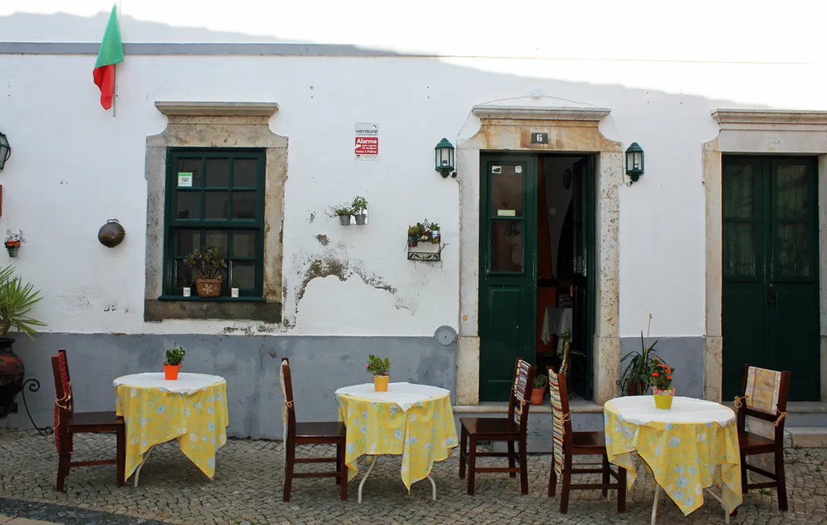 Narrow cobblestone lane in Faro old town near the historic Judaria Jewish Quarter