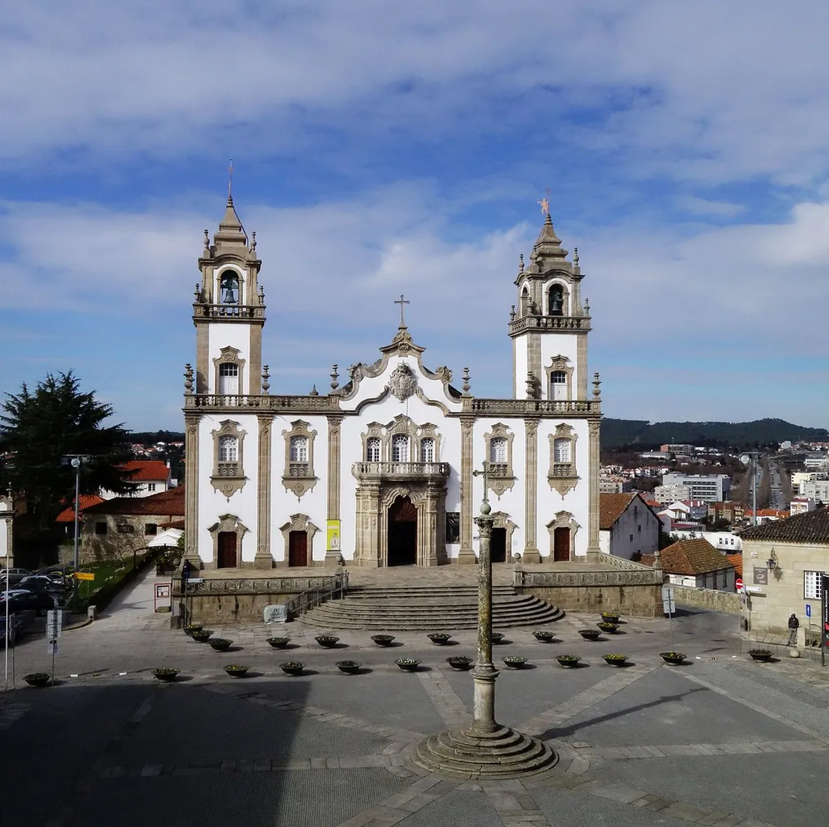 Faro Cathedral rising above the historic Vila Adentro district during spring celebrations in the Algarve