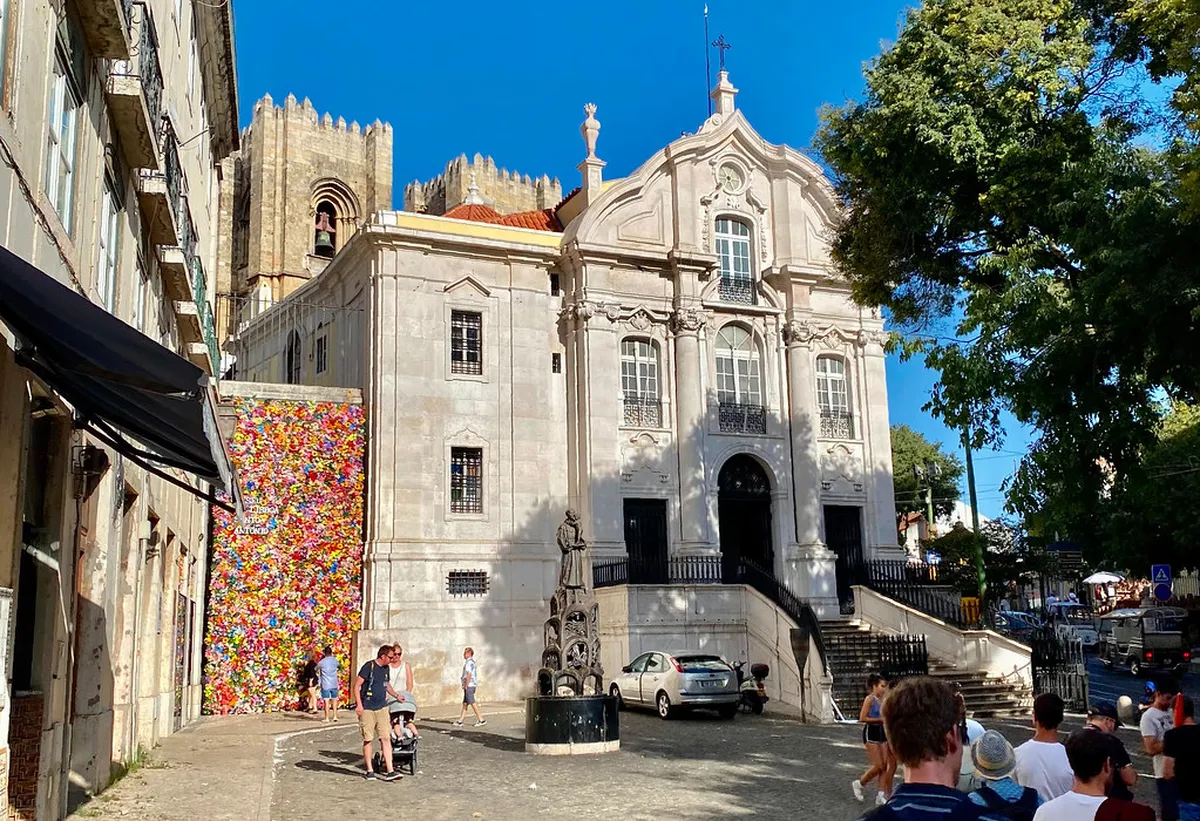 Colorful street decorations and lanterns in Lisbon's Alfama district during the June Santos Populares festivities