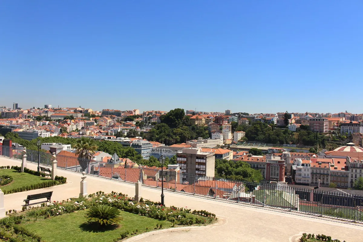 Panoramic Lisbon cityscape viewed from the Miradouro de São Pedro de Alcântara viewpoint in Bairro Alto