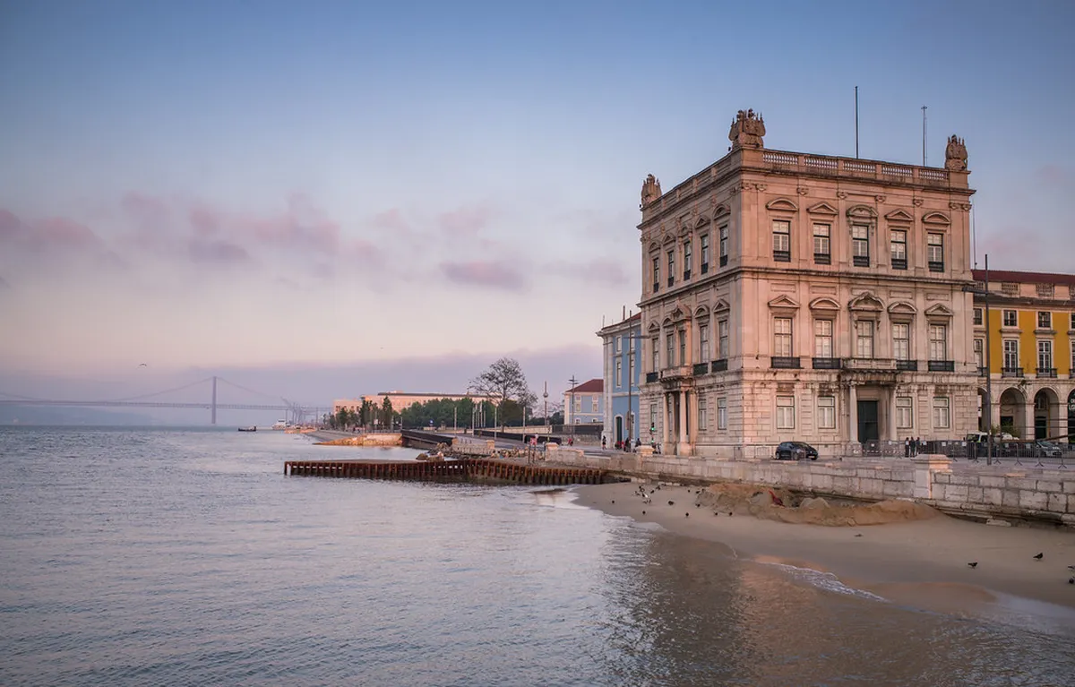 Panoramic rooftop bar terrace in Lisbon Bairro Alto with views over the city at sunset