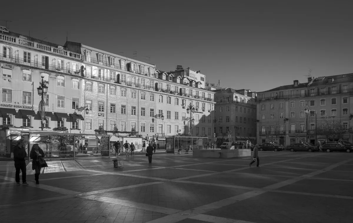 The elegant Pombaline architecture of Lisbon's Baixa district, rebuilt after the devastating 1755 earthquake with uniform arcaded facades