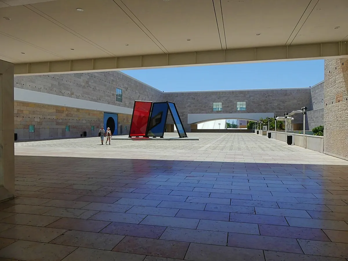 Lisbon Belém cultural district with the modern CCB arts center and riverside promenade views