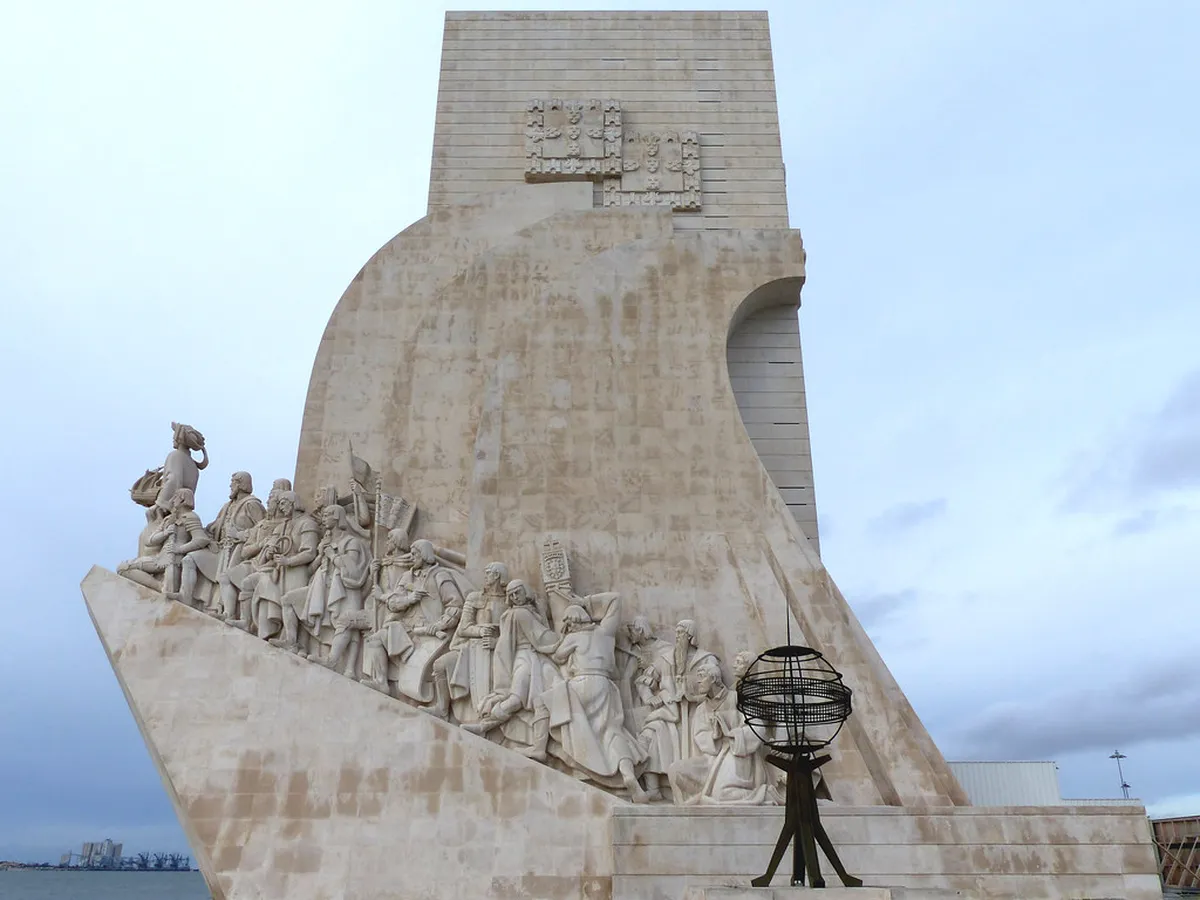 Lisbon's Padrão dos Descobrimentos monument rising above the Tagus River waterfront in Belém
