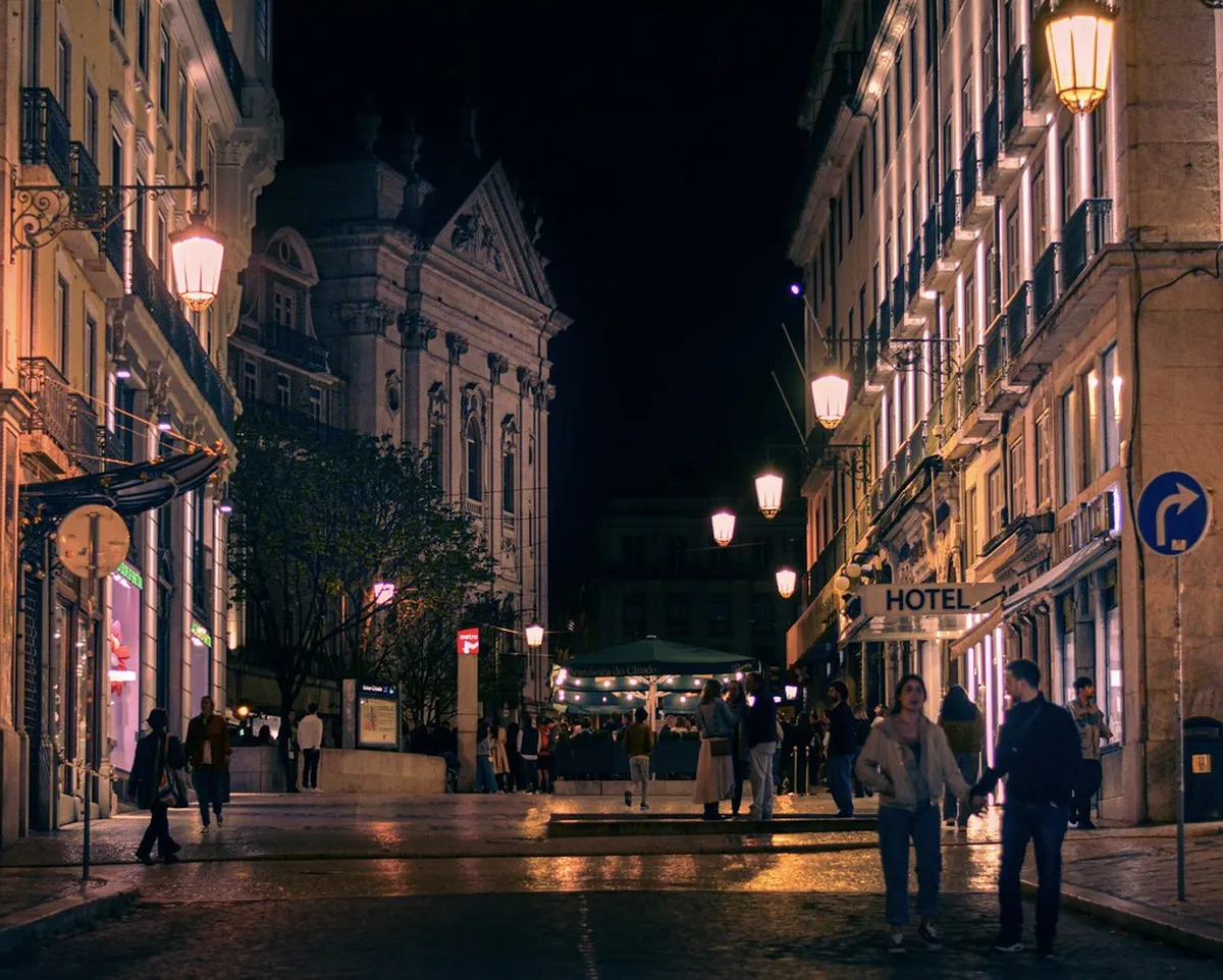 Largo do Chiado in Lisbon, a sunlit public square surrounded by cafes and boutique storefronts