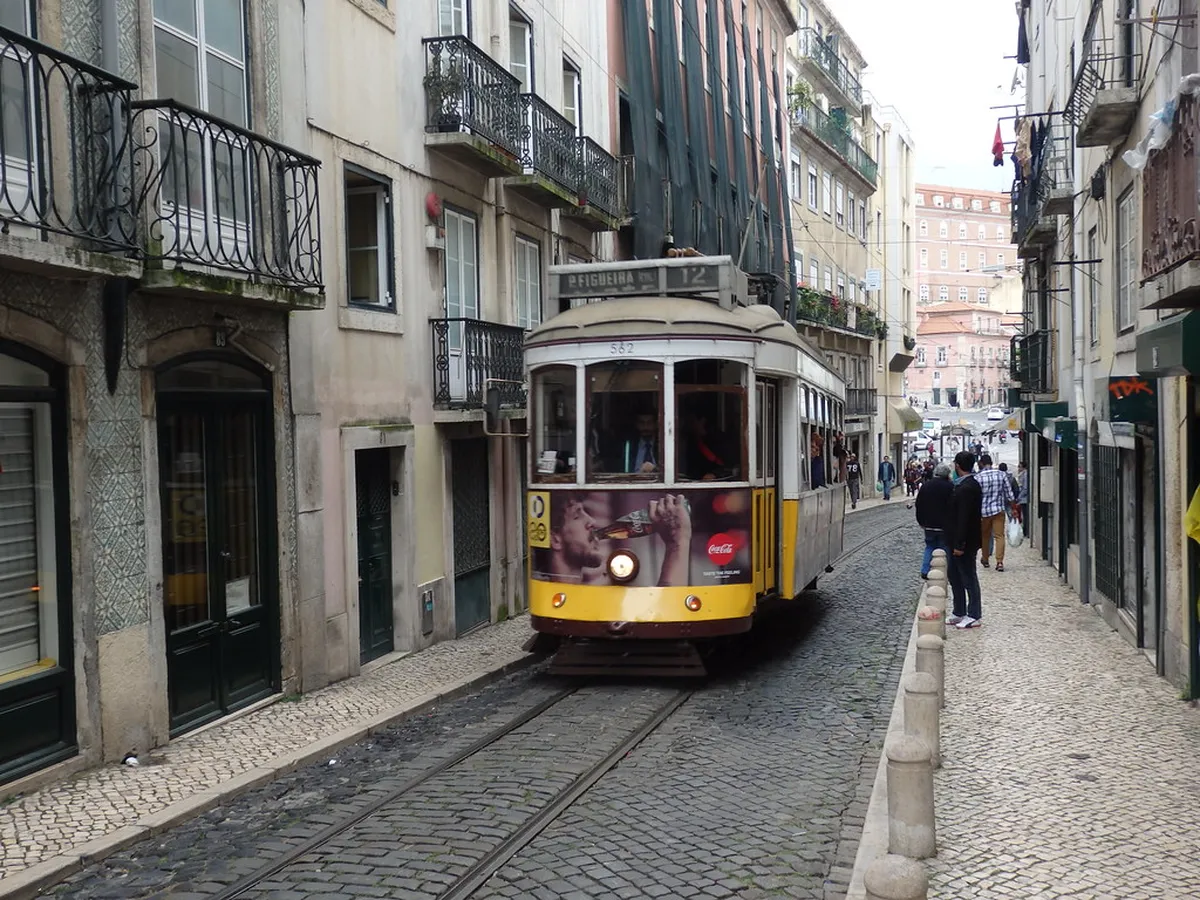 Vibrant Mouraria street scene in Lisbon with traditional architecture and local character