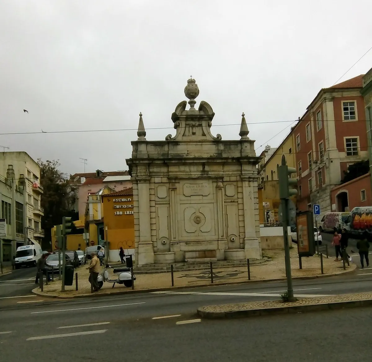 Largo do Intendente square in Lisbon with colorful tiled buildings, a vibrant hub for local street food stalls