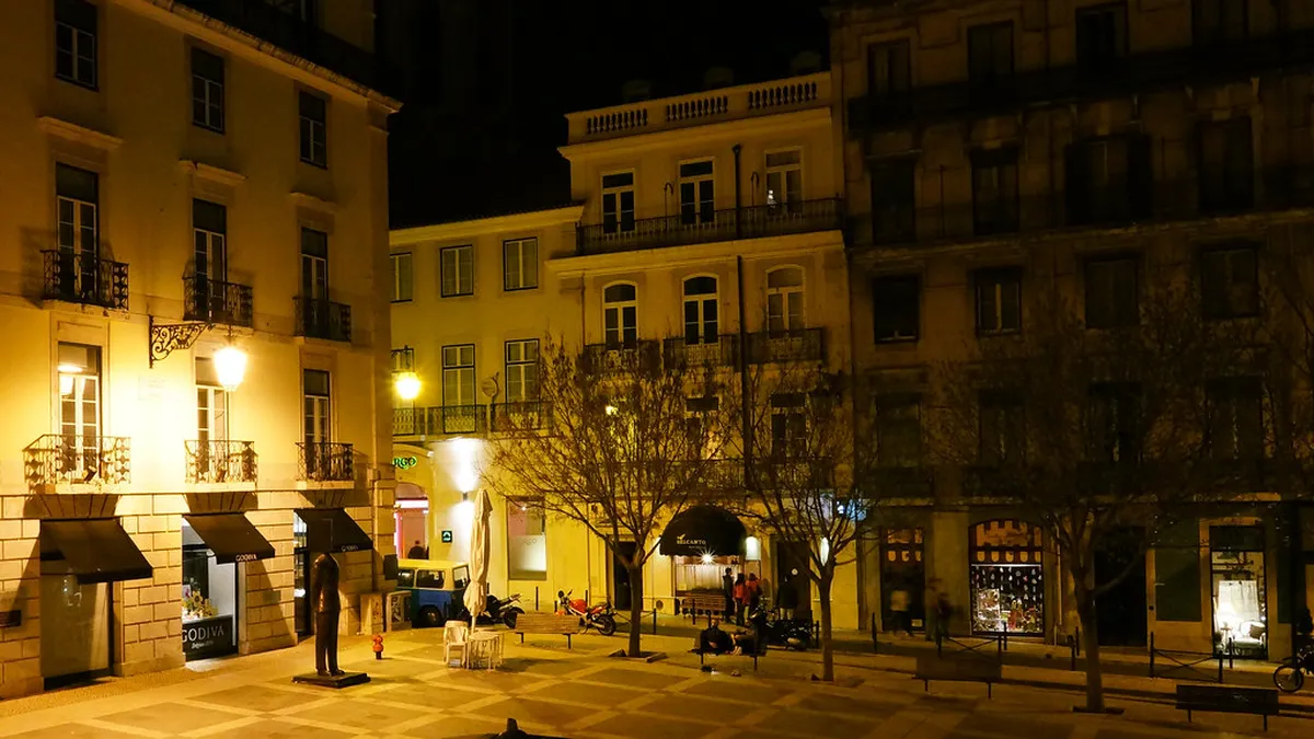 Lisbon illuminated at night with atmospheric streets and cultural venues in the Chiado area