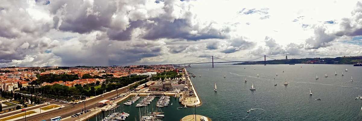 The Padrão dos Descobrimentos monument rising beside the Tagus River in Lisbon's Belém district