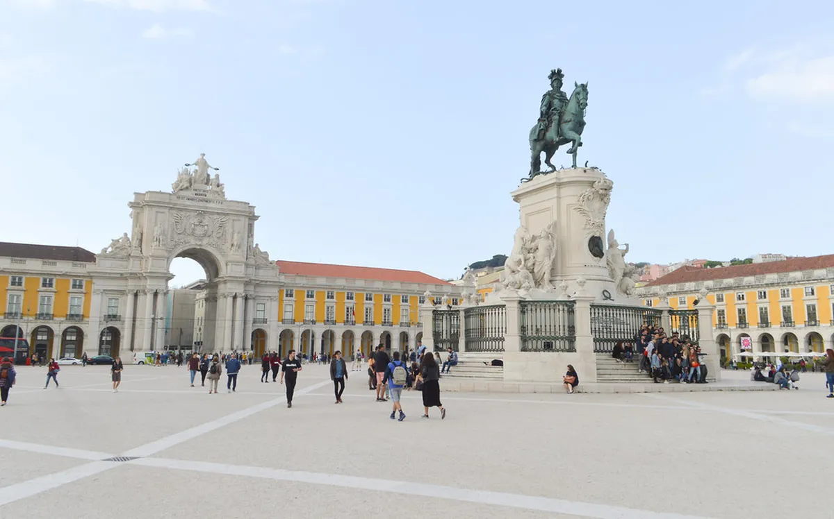 Praça do Comércio in Lisbon with the Tagus River and Rua Augusta Arch in the background