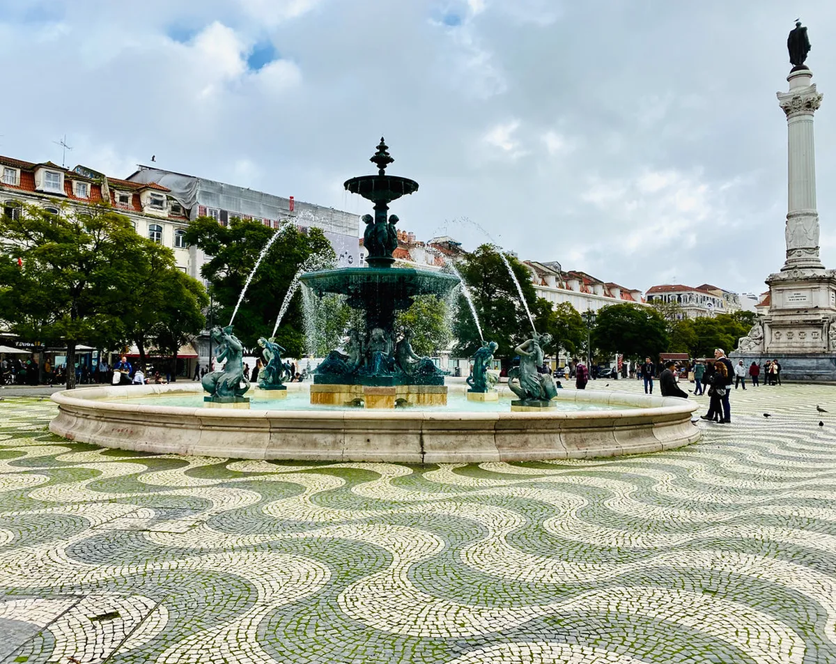 Rossio Square in Lisbon with the ornate wavy mosaic pavement and Dom Pedro IV column