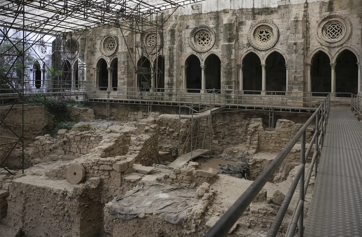 Lisbon Sé de Lisboa cathedral cloister with visible archaeological excavation layers beneath the medieval stonework