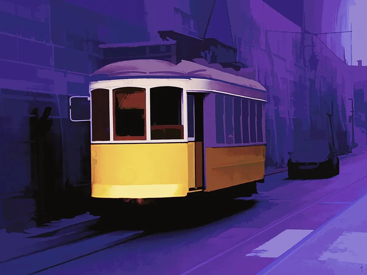 Vibrant purple-painted street in Lisbon with traditional architecture lining the pedestrian walkway
