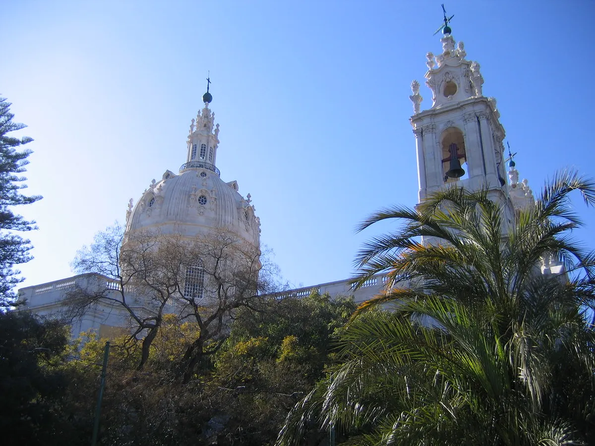 Basílica da Estrela in Lisbon with its iconic white dome and Baroque Neoclassical facade overlooking the neighbourhood