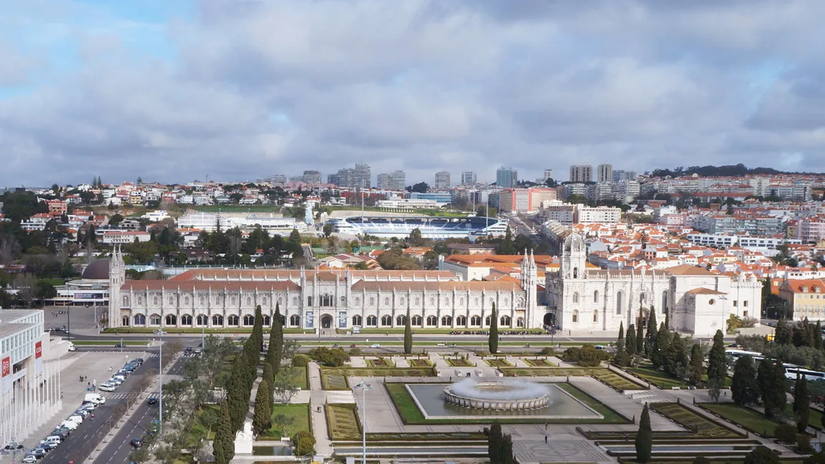 Scenic Belém district waterfront in Lisbon with the Tagus River and iconic tower in the distance
