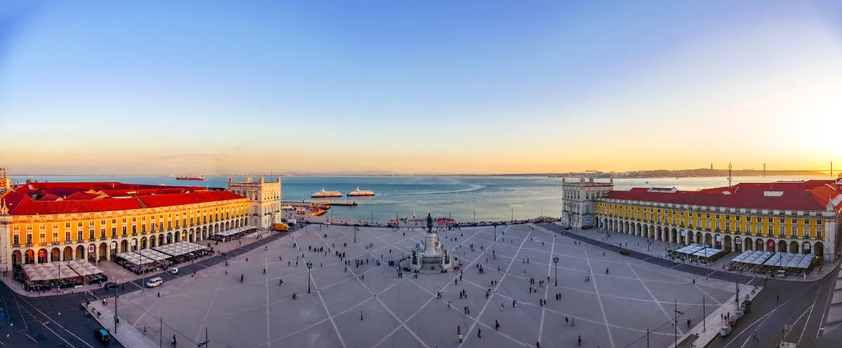 Lisbon's Praça do Comércio grand waterfront square with the Arco da Rua Augusta and the Tagus River in the background