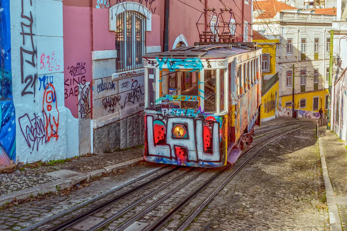 Lisbon's Praça Luís de Camões at the edge of Chiado and Bairro Alto with the Camões statue and surrounding cafe terraces