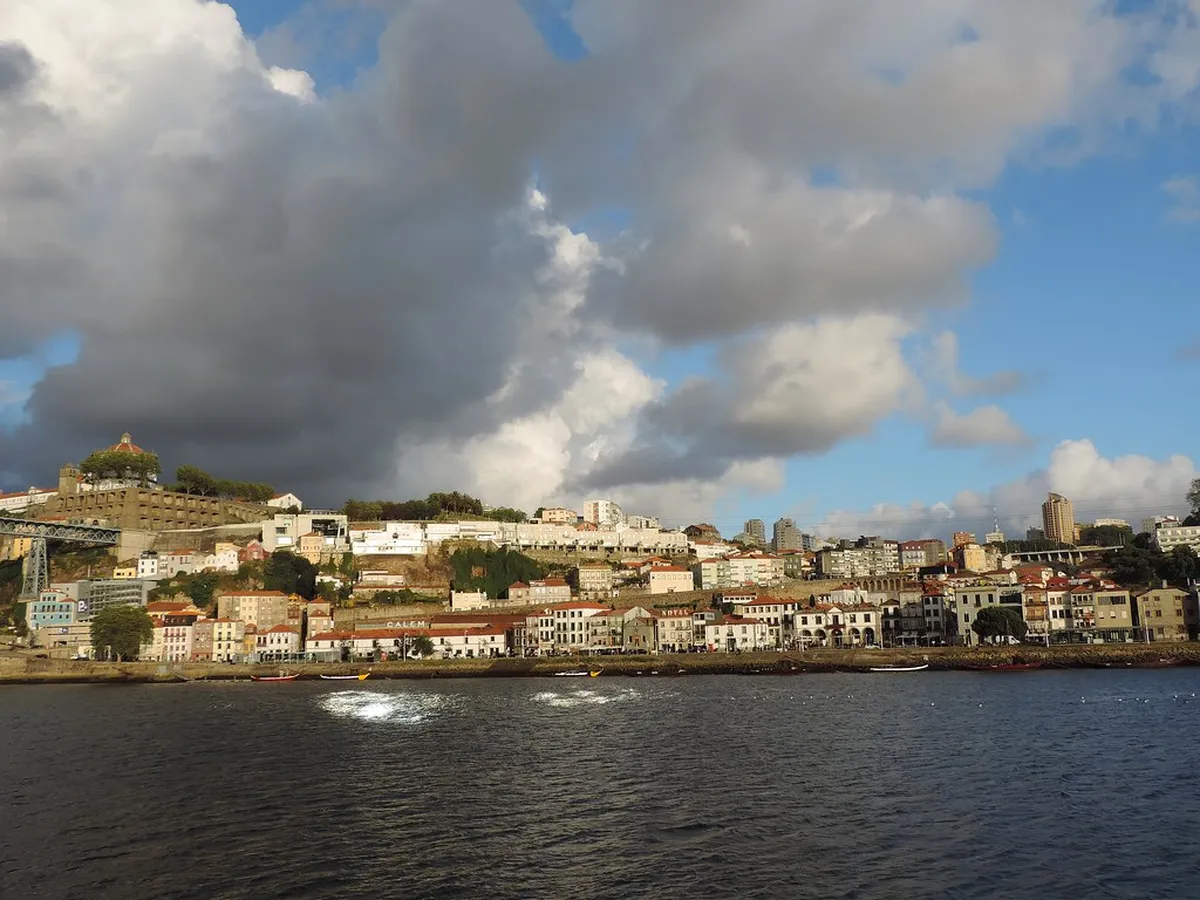 Porto Ribeira District colorful waterfront houses reflected in the Douro River
