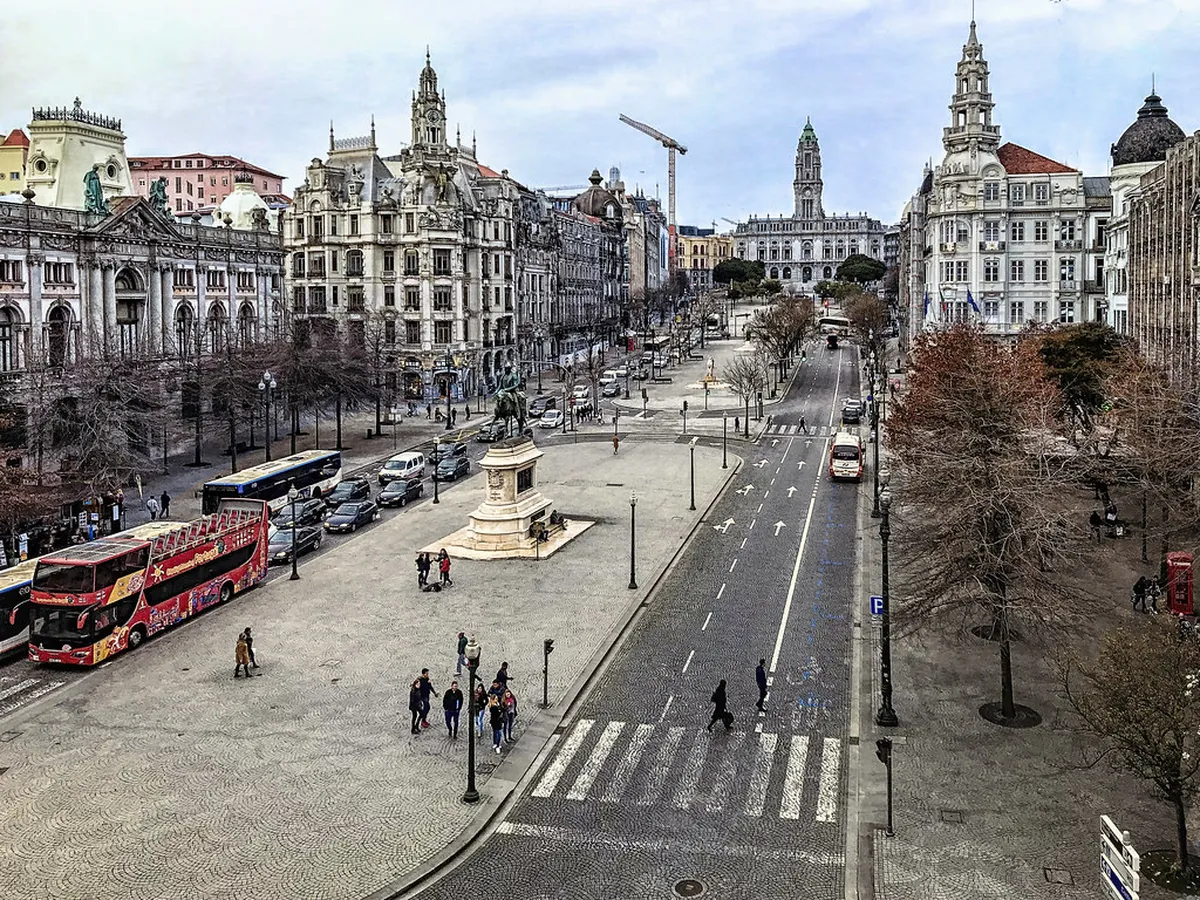 Porto Aliados Avenue grand boulevard lined with ornate civic buildings in the historic Baixa district