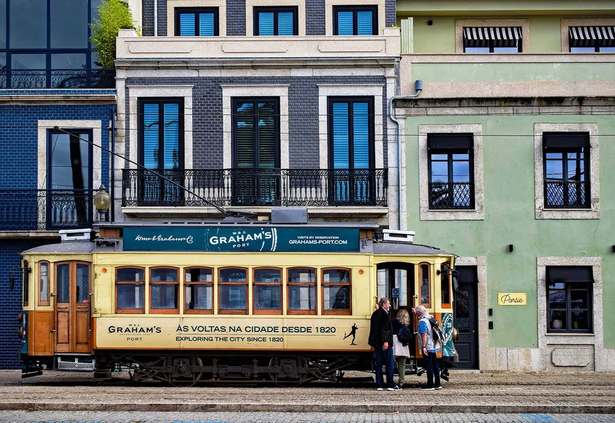 Porto cobblestone street winding through a historic neighborhood with traditional tiled buildings