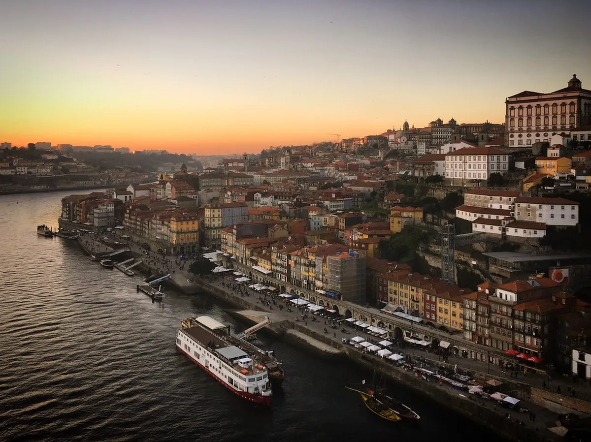 Porto Ribeira quay with colorful buildings lining the Douro River waterfront