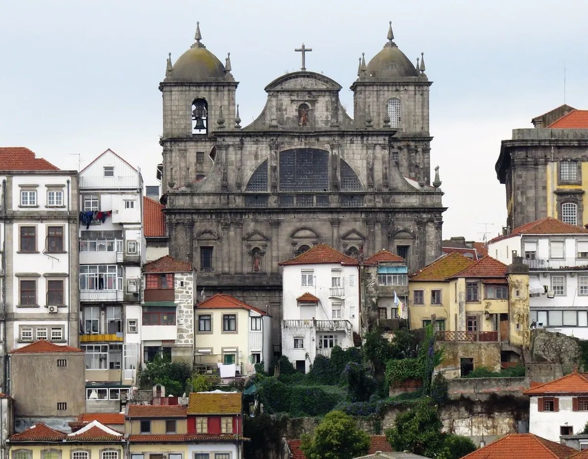 Porto São Bento da Vitória Monastery Baroque facade along a narrow cobblestone street in the historic district