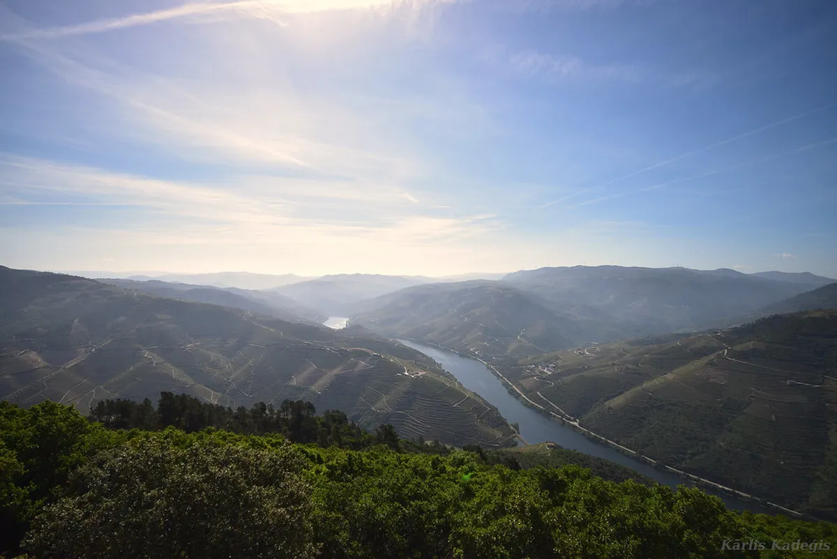 Panoramic Porto viewpoint overlooking the Douro River and terracotta rooftops from a hilltop miradouro