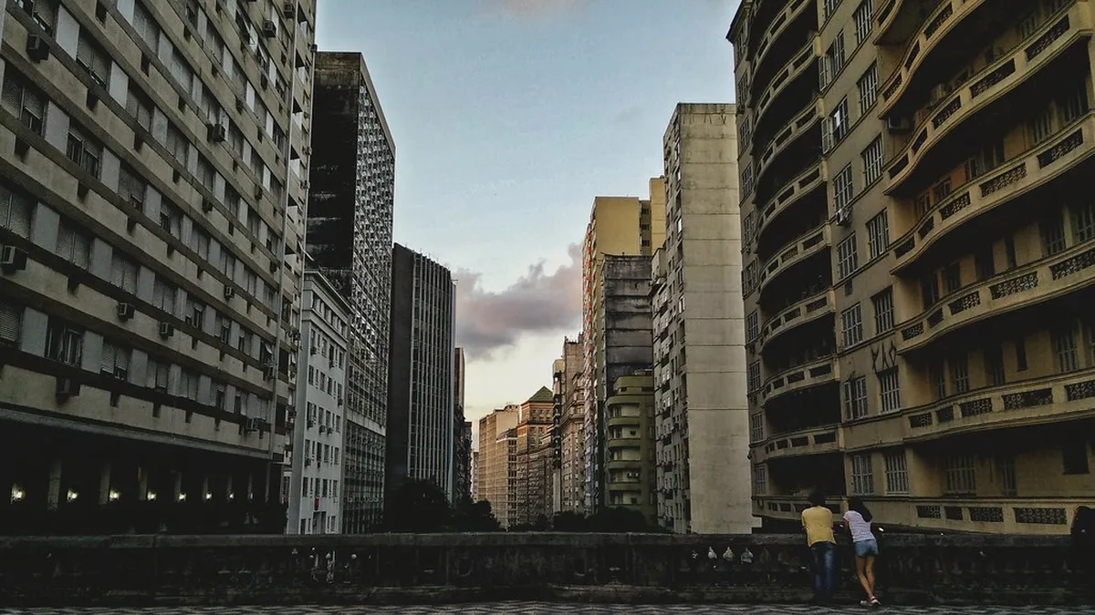 Historic Porto street lined with traditional azulejo-tiled facades and ornate Baroque architecture near the city centre